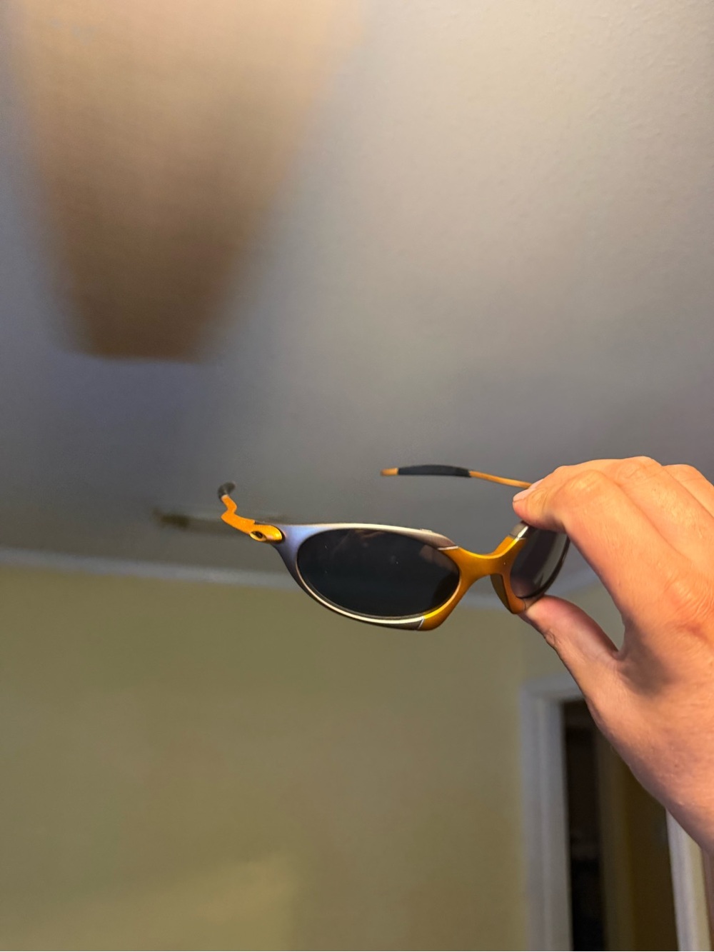 Yellow Cat-Eye Sunglasses with Black Lenses Oakleys Oakley